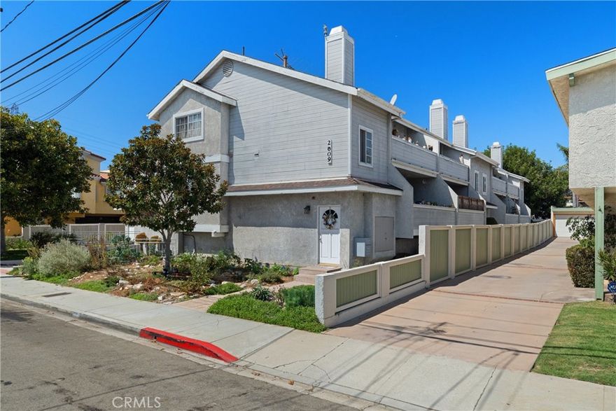 NEW PRICE! Welcome to 2609 Vanderbilt Lane #4, a bright and inviting move-in-ready end-unit townhome in the heart of Redondo Beach. With only one shared wall and windows on three sides, this home enjoys abundant natural light and a great sense of privacy. The main level features an open living and dining area with brand-new flooring, fresh paint, and access to a private balcony. The kitchen has been updated with new appliances and showcases classic oak cabinetry with plenty of storage and counter space. A half bath is also located on this floor. Upstairs you’ll find two generous primary suites, each with vaulted ceilings, walk-in closets, and en-suite bathrooms. One suite also includes a private balcony. The laundry is conveniently located on this level as well. Downstairs features a third bedroom or office, a large closet, and direct access to the oversized two-car garage. Additional highlights include rebuilt balconies with new waterproofing and thoughtful updates throughout. Set in a well-kept community close to beaches, parks, shopping, top-rated schools, and with easy freeway access, this home offers the perfect blend of comfort, convenience, and coastal living.