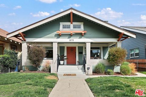 Photo of 3878 S Harvard Boulevard, Los Angeles, CA 90062 (MLS # 26668093)