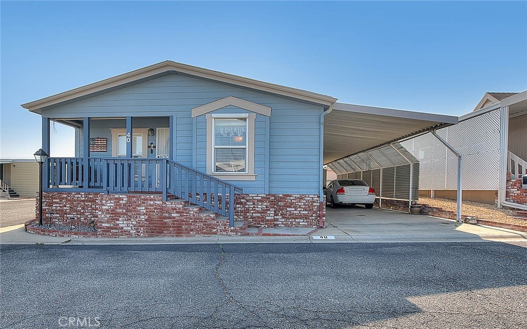 Welcome to this beautifully maintained 3-bedroom, 2-bath manufactured home located in the desirable Chaparral Heights Mobile Home Park 55+ community. Situated on a prime corner lot, this home offers a spacious and inviting layout featuring a generous living and dining room, perfect for entertaining. The kitchen includes a cozy breakfast nook and plenty of cabinet space, while the separate laundry room adds extra convenience. Enjoy stylish plantation shutters throughout the home that offer both privacy and charm. Outside, you’ll find fresh exterior paint, a covered carport, and a handy storage shed. With easy access to freeways, shopping centers, and great local restaurants, this location combines comfort and convenience. Don’t miss the opportunity to make this lovely home your own!