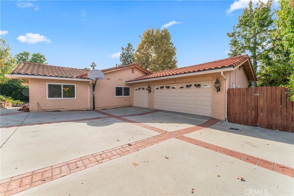 Photo of 8610 Delmonico Avenue, West Hills, CA 91304 (MLS # SR25258795)