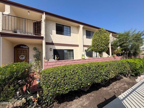 Photo of 13900 Studebaker Rd #24, Norwalk, CA 90650 (MLS # P1-26665)