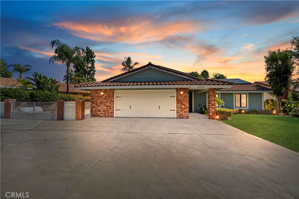 Arrive in style through the circular driveway and expansive flat lot—a hard-to-find feature in Canyon Lake—offering effortless parking for RVs, trucks, boats, and all your toys. With the added bonus of a paid-off 28-panel solar system, this single story home blends convenience, efficiency, and lifestyle.
Inside, natural light flows through an inviting living space that opens seamlessly to the kitchen and dining area, creating the perfect environment for gatherings. The kitchen offers ample counter space and cabinetry, while the living room centers around a warm, welcoming atmosphere ideal for entertaining or relaxing at home. Low-maintenance synthetic turf in both the front and backyards keeps outdoor spaces green and inviting year-round.
The primary suite is a private retreat with generous proportions, complemented by spacious secondary bedrooms to accommodate family, guests, or a home office. Bathrooms are well-designed with thoughtful finishes, and everyday functionality.
Step outside to a backyard designed for leisure and possibility. The covered patio is perfect for twilight dining, while the large open yard offers room to garden, play, or simply enjoy the California sunshine. Fruit trees and mature landscaping enhance the sense of privacy and connection to nature. All of this comes with the perks of living in Canyon Lake’s guard gated community—Residents enjoy private access to a 400-acre lake for boating, fishing, and paddleboarding, an 18-hole golf course, equestrian center, community pool, clubhouse dining, and over 15 parks and beaches with playgrounds and picnic areas. Whether it’s tennis, pickleball, concerts at the lodge, or fireworks at Happy Camp, there’s always something to enjoy in this gated community.
lake access, boating, private parks, golf, tennis, and a true resort lifestyle!
