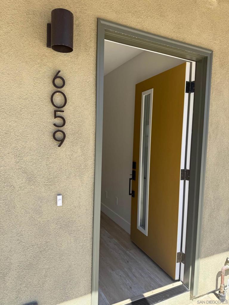 Quiet lower level fully renovated unit with laminate flooring throughout, stainless steel appliances, large private patio off kitchen, ceiling fans in all room and shared laundry room with CC operated machines. Unit has its own EV charging plug and one reserved parking. This is a six unit complex located just a short walk to Wind'n Sea beach, shops and restaurants in Birdrock. Available for immediate occupancy.