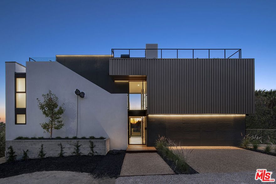 New Construction Furnished/unfurnished, 4-bed, 4-bath architectural masterpiece perched in the coveted Hollywood Hills. This sustainable luxury home features floor-to-ceiling glass walls framing breathtaking canyon and mountain views, a seamless indoor-outdoor flow, and designer finishes throughout. Enjoy multiple balconies, a resort-style pool deck, and a rooftop entertainment terrace with built-in grill. Smart-home technology, eco-conscious materials, and net-zero energy design elevate this residence into a rare fusion of innovation. Main Floor has 2 Bedrooms, Upstairs has Primary Bedroom, and lower level has 1 Bedroom along with living room + Bonus room and outdoor layered yard and pool with views.  Rooftop with entertaining area as well. Many areas not photographed.