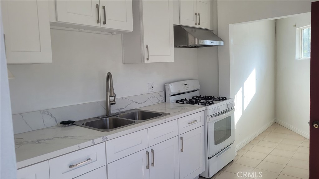 Welcome to this beautifully updated 3 bedrooms, 2 baths home located on a quiet tree lined street in the sought after El Sereno area of Los Angeles. Situated on a spacious corner lot, this move-in ready home offers comfort convenience and charm. Just step inside to find fresh new paint, stylish new laminated flooring throughout, and a remodeled kitchen with new cabinets. This house also includes a bonus room-ideal as a playroom, exercise space, home office or guest bedroom. Located close to local schools, public transportation, nearby parks with quick access to major freeways, this home offers the perfect balance of urban convenience and neighborhood tranquility.