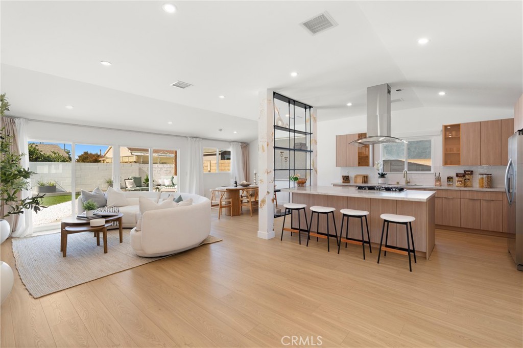 A home this BEAUTIFULLY REBUILT is rare - but finding it in one of Buena Park’s MOST BELOVED NEIGHBORHOODS makes it truly special.
Located just 10 minutes from Disneyland, 3 minutes from Knott’s Berry Farm & Soak City, and close to Los Coyotes Country Club Golf Course, Ralph B. Clark Park, Porto’s Bakery, shopping, fine dining, beaches, and more - this SINGLE-STORY RESIDENCE with a POOL has been thoughtfully reimagined by one of California’s TOP LUXURY CONTRACTORS.
FULLY REBUILT IN 2025 WITH PERMITS, this home features all-new PEX plumbing (including underground). From sewer line to skyline - everything here is BRAND NEW: electrical, roof, wide plank laminate flooring, dual-pane windows, HVAC, tankless water heater, and more - offering the perfect blend of MODERN COMFORT and timeless appeal.
The light-filled, OPEN-CONCEPT layout is enhanced by elevated finishes throughout. The CUSTOM-DESIGNED KITCHEN serves as the heart of the home, with quartz countertops, built-in appliances, floating shelves, and a STUNNING OVERSIZED ISLAND with gas and electric hookups, plus a built-in seating feature.
Enjoy seamless indoor-outdoor living with direct access to a private ENTERNTAINER'S BACKYARD featuring a NEWLY REFINISHED POOL, upgraded pool equipment, expansive PATIO, and professionally LANDSCAPED GROUNDS with real grass and turf — ideal for BBQs, al fresco dining, or summer gatherings.
Additional highlights include APPROVED Junior ADU plans, a NEW driveway and drywall, and CUSTOM TOUCHES like recessed lighting, eco-friendly waterproof paint, and hand-painted statement columns that make this home truly one of a kind.
Whether you’re searching for your FOREVER HOME or a SMART INVESTMENT, this property delivers it all - style, comfort, location, and even SHORT-TERM RENTAL potential.
FALL IN LOVE WITH THE CRAFTSMANSHIP, FEEL THE WARMTH OF THE COMMUNITY, AND MAKE THIS REMARKABLE HOME YOUR OWN!