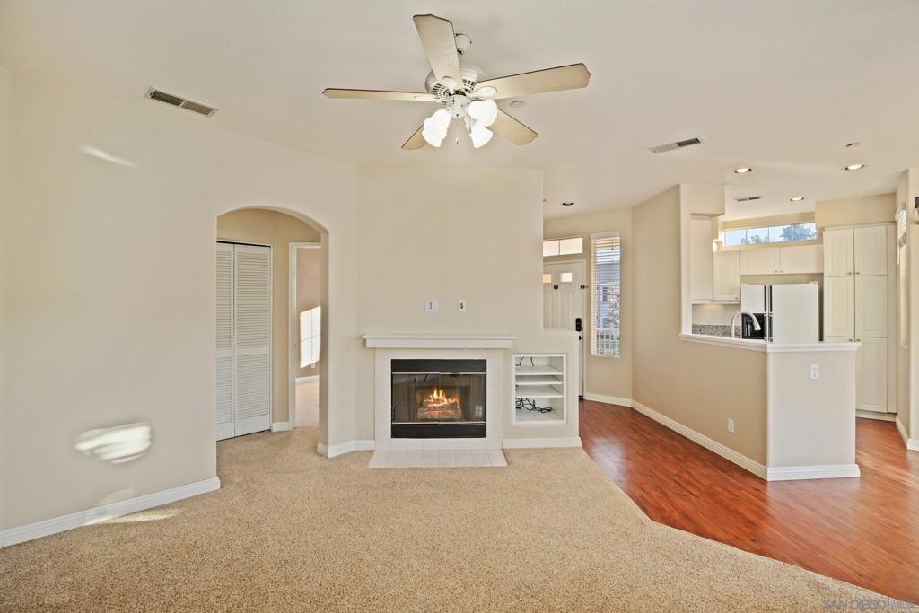 Turnkey Retreat in Sabre Springs!Welcome to this beautifully updated home featuring an open floor plan filled with natural light. The stylish kitchen boasts crisp white cabinetry, modern appliances, and a seamless flow into the spacious living area complete with a cozy fireplace. Additional highlights include upgraded bathroom vanities, in-unit laundry, and sliding glass doors leading to a private balcony — perfect for relaxing or entertaining.Residents of the Palo Alto community enjoy access to resort-style amenities including a pool, spa, and fitness center. Conveniently located just off the I-15, this home offers easy access to top-rated schools, shopping, dining, and everything San Diego has to offer.