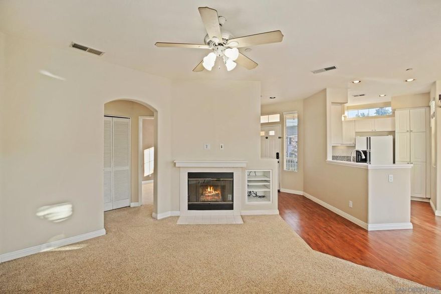 Turnkey Retreat in Sabre Springs!Welcome to this beautifully updated home featuring an open floor plan filled with natural light. The stylish kitchen boasts crisp white cabinetry, modern appliances, and a seamless flow into the spacious living area complete with a cozy fireplace. Additional highlights include upgraded bathroom vanities, in-unit laundry, and sliding glass doors leading to a private balcony — perfect for relaxing or entertaining.Residents of the Palo Alto community enjoy access to resort-style amenities including a pool, spa, and fitness center. Conveniently located just off the I-15, this home offers easy access to top-rated schools, shopping, dining, and everything San Diego has to offer.