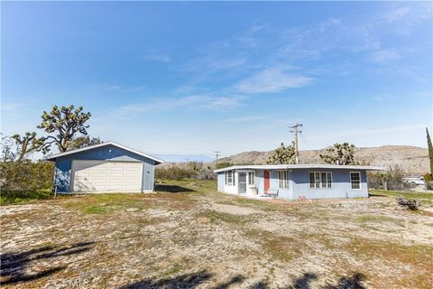 Photo of 7148 Sage Avenue, Yucca Valley, CA 92284 (MLS # JT26023962)