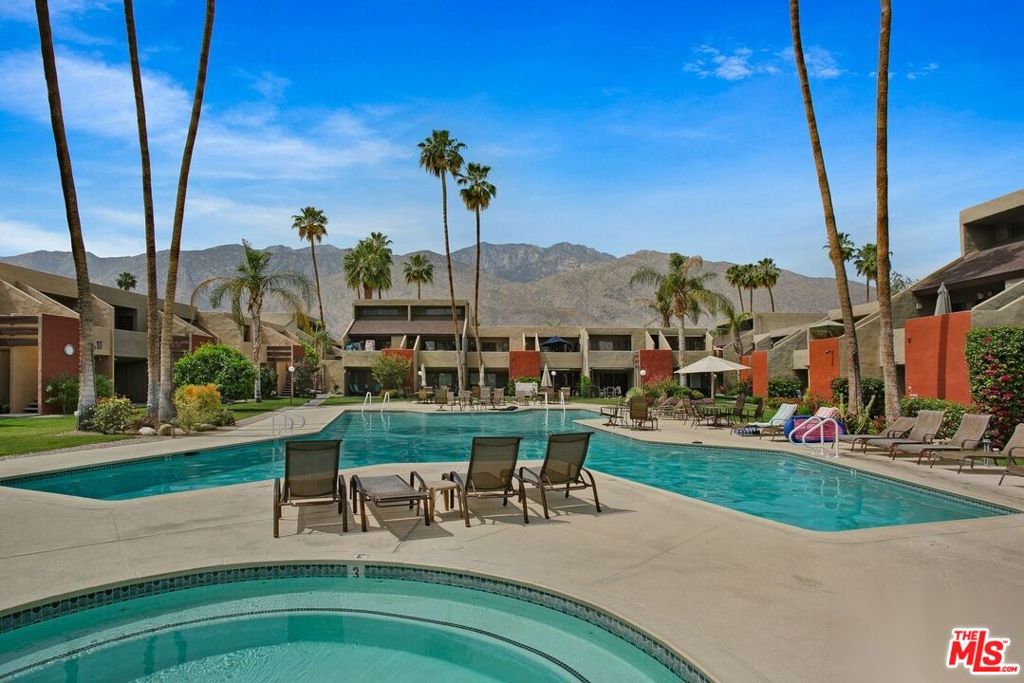Welcome to your desert escape at Smoke Tree Racquet Club, one of the most sought-after communities in Palm Springs. Known for its iconic mid-century modern vibe, lush green grounds, and one of the largest pools in the city, this place has everything you need to live the Palm Springs lifestyle. Just five minutes from downtown, this superb second-floor one-bedroom, one-bath condo offers 755 square feet of bright, open living space with unforgettable views of the majestic Mount San Jacinto. Inside, you'll find a completely refreshed home with new flooring, fresh paint, a brand-new HVAC system, and a new hot water heater. The kitchen has been opened up to flow into the spacious great room, creating a comfortable and inviting space to relax or entertain. The furnishings are sleek and modern yet designed for comfort, including a sofa you can actually stretch out on. Step outside onto your oversized private balcony where you can enjoy morning coffee, an evening glass of wine, or simply take in the mountain views. There's plenty of space for both a dining table and a comfortable outdoor sofa, making it the perfect spot to unwind any time of day. Living here feels like being on vacation every day. You'll have access to lighted tennis and pickleball courts, a beautifully landscaped central park area, an oversized spa, and one of the largest and most beautiful pools in Palm Springs. Grocery stores, coffee shops, and boutiques are right across the street, and downtown's restaurants, galleries, and nightlife are just minutes away. Whether you're looking for a stylish full-time residence, a weekend getaway, or an income-producing property this condo has been a successful Airbnb Unit 318 delivers comfort, style, and the kind of Palm Springs living people dream about.