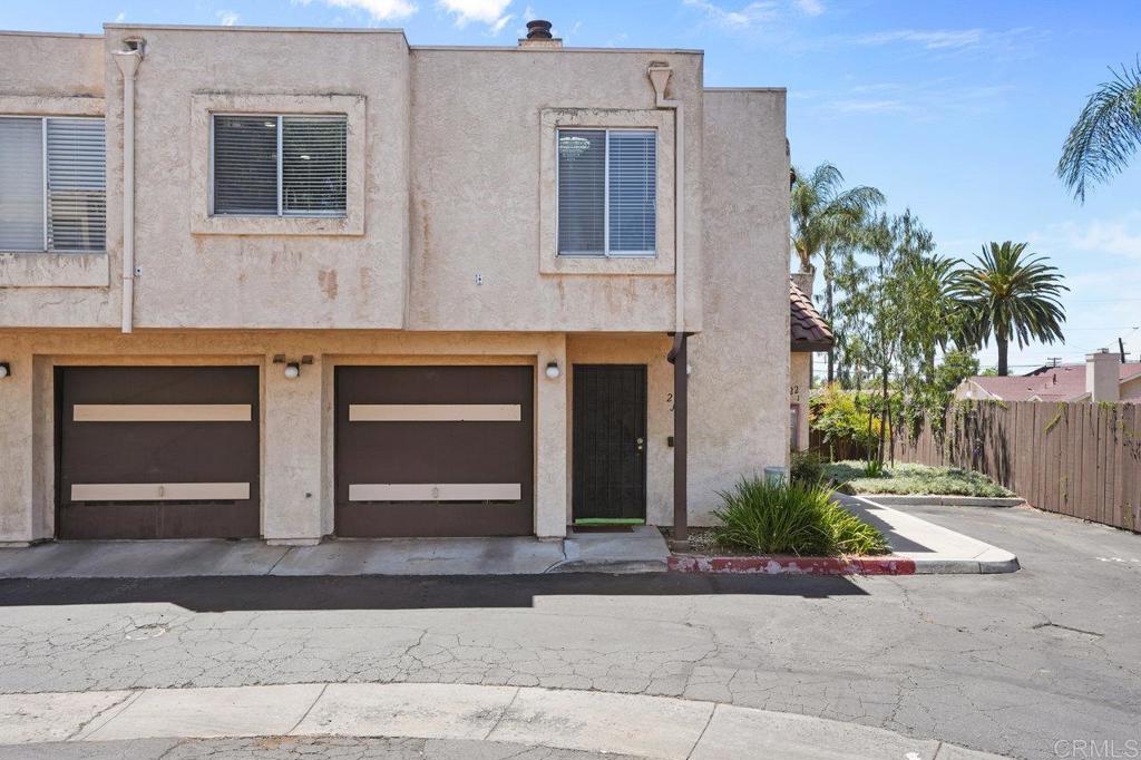 FHA & VA Approved!! Welcome to Unit 23J at 514 Jamacha Rd in El Cajon—a beautifully updated 2-bedroom, 1-bath condo offering modern comfort and convenience. This move-in-ready home features an attached garage equipped with a Tesla-compatible EV charger, ideal for electric vehicle owners. Inside, you'll find a fully renovated kitchen with newer cabinets, sleek countertops, and stainless steel appliances. The bathroom has also been upgraded with a stylish dual-sink vanity and a spacious walk-in shower. New vinyl plank flooring flows throughout the home, adding a clean, contemporary touch. Additional highlights include in-unit laundry hookups, vaulted ceilings, and two private balconies. Located in the desirable Jamacha Greens community, residents enjoy access to a pool, spa, and tennis courts, all within close proximity to shopping, dining, and major freeways. This unit combines thoughtful upgrades with an unbeatable location—don’t miss the chance to make it yours!