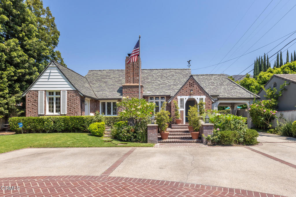 Welcome to 369 W. Kenneth Road, a charming 4-bedroom, 3-bathroom home in the heart of Glendale. A fantastic location, updated features, and so much charm! As you enter, you'll be greeted by hardwood floors and vaulted ceilings that give the home a spacious and elegant feel. The chef's kitchen is equipped with modern stainless steel appliances and a layout that sparks culinary inspiration. Separate dining room off the kitchen for entertaining. The house has in-home laundry room, a basement for extra storage, wine bar in the sunroom. The primary bedroom is a sanctuary of comfort, featuring an ensuite bathroom and a generously sized closet, providing a private retreat within the home. Outside offers a private yard, built-in grill, and a rejuvenating spa, offering a serene escape. The roundabout driveway provides ample parking, ensuring convenience for you and your guests.