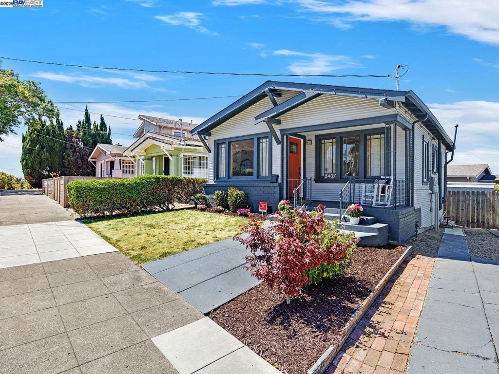 Sunny & bright house with studio nestled in the heart of Maxwell Park. This charming single-family home offers a cozy and intimate living space, perfect for those seeking comfort and simplicity. Its living area includes 2 Bd/1 Ba in a thoughtfully designed open floorplan to maximize space. The layout creates an inviting atmosphere infused with natural light, enhancing a warm ambiance throughout the home. Laundry is inside and the kitchen has quartz countertops with a quartz waterfall breakfast bar, stainless steel appliances, and modern cabinetry. There is a converted garage that adds flexibility for an office, gym, studio, workshop or extra storage. The long driveway provides off-street parking for 2-3 vehicles, and the lot presents opportunities for gardening enthusiasts. Ideally situated in Maxwell Park, this home offers a friendly community feel with convenient access to local shops, parks, and transportation. It is well-located for those who want to experience the best of both worlds: a peaceful residential setting with easy access to urban amenities. Whether you are a first-time buyer, an investor looking for potential, or someone who simply appreciates vintage charm, 5407 Roberts Ave is a fantastic opportunity. Come see for yourself!