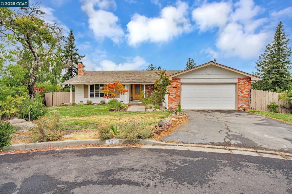 Welcome to 92 Gaywood Place, a charming single-level home. Located on a tranquil cul-de-sac, this 4-bedroom, 2-bathroom home spans 1,839 sqft of living space and a generous 19,200 sqft lot. Inside you’ll discover hardwood floors, ample living space in the formal living room, a cozy fireplace, and a formal dining room. The heart of the home is undoubtedly the family/kitchen room combination, where you'll find plenty of room to relax or entertain. Just off the family room, step out onto the deck, perfect for enjoying your morning coffee or dining al fresco while soaking in the scenic views. For those who love to entertain, the private outdoor space with a large pool promises endless fun and relaxation. This property is not just a house; it’s a lifestyle. With its large yard, there's plenty of room for gardening, play, or simply unwinding in your own pool. Wake up to a beautiful view in your primary suite that has a walk-in closet. Three more good-sized bedrooms offer plenty of space. A laundry room is conveniently located inside the home along with a large walk-in pantry. Central AC and forced air heating that ensure year-round comfort. There is a separate room with a bathroom on lower level. Possible ADU. Just minutes to Elementary and Intermediate Top Rated Moraga Schools.