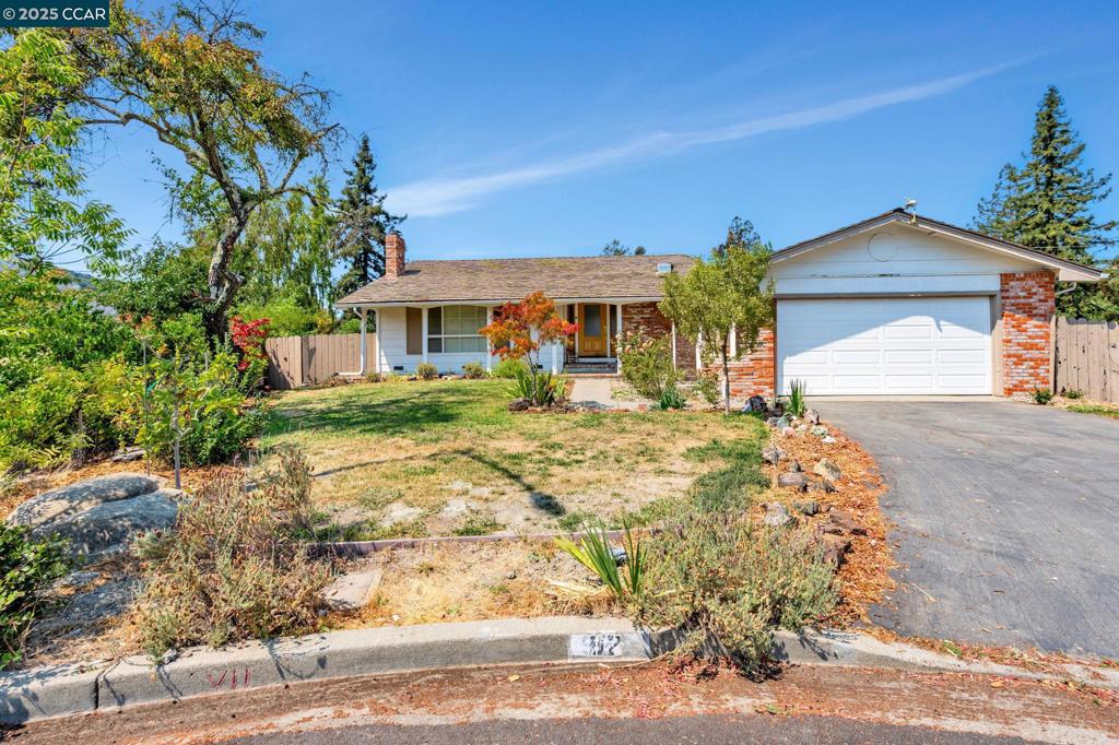 Welcome to 92 Gaywood Place, a charming single-level home. Located on a tranquil cul-de-sac, this 4-bedroom, 2-bathroom home spans 1,839 sqft of living space and a generous 19,200 sqft lot. Inside you’ll discover hardwood floors, ample living space in the formal living room, a cozy fireplace, and a formal dining room. The heart of the home is undoubtedly the family/kitchen room combination, where you'll find plenty of room to relax or entertain. Just off the family room, step out onto the deck, perfect for enjoying your morning coffee or dining al fresco while soaking in the scenic views. For those who love to entertain, the private outdoor space with a large pool promises endless fun and relaxation. This property is not just a house; it’s a lifestyle. With its large yard, there's plenty of room for gardening, play, or simply unwinding in your own pool. Wake up to a beautiful view in your primary suite that has a walk-in closet. Three more good-sized bedrooms offer plenty of space. A laundry room is conveniently located inside the home along with a large walk-in pantry. Central AC and forced air heating that ensure year-round comfort. There is a separate room with a bathroom on lower level. Possible ADU. Just minutes to Elementary and Middle top rated Moraga Schools.