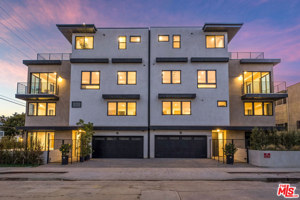 Welcome to The Barry Collection, an exclusive community of brand-new single-family homes set right in the heart of one of the most trending neighborhoods on the Westside. With in-home elevators and a private 2 car garages, you can enjoy the entire space with ease and privacy, including a spacious rooftop deck with gorgeous views of the City. This 4-bedroom, 4.5-bathroom corner residence spans approximately 3,100 square feet and offers a rare combination of thoughtful design and high-end finishes, including stunning countertops, wide-plank European oak wood floors, Andersen windows and Fleetwood sliding doors typically only found in high end estates. Enjoy seamless flow across the open-concept living, dining, and kitchen spaces, where a large center island, walk-in pantry, and top-of-the-line Thermador appliances create a true chef's kitchen. Floor-to-ceiling windows and doors flood the home with natural light, while multiple outdoor spaces provide the perfect backdrop for entertaining or relaxing under the California sun. Each bedroom is generously sized with its own en-suite bathroom and finished closet, offering ultimate comfort and privacy. Multi-generational living would be a breeze with the elevator and ideal floorplan with bedrooms on multiple levels. A high walk score of 76, close to all the best restaurants and shops on Sawtelle. Centrally located, convenient to UCLA, Santa Monica and the best of what Los Angeles has to offer. A rare blend of luxury, lifestyle, and convenience.