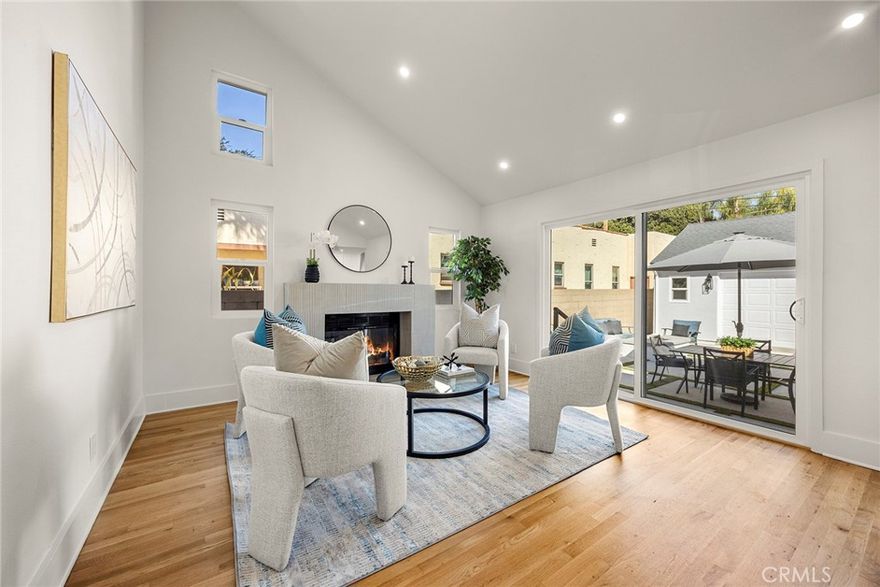 Welcome to 1205 Central Ave a beautifully updated and remodeled Craftsman gem in the desirable lower Raymond Hills neighborhood of Fullerton! This charming home welcomes you with a spacious front porch, perfect for relaxing on warm summer evenings, and is ideally located close to Raymond Elementary School. The main house offers approximately 1,767 sq. ft. of comfortable living space featuring 3 bedrooms and 2 bathrooms, an open and spacious inviting living room, a family room with vaulted ceiling and a cozy fireplace, and a convenient inside laundry room. Natural light fills the home through abundant windows, highlighting the open floor plan, remodeled kitchen and bathrooms, and beautiful wood and tile flooring throughout. Adding to its versatility, the property includes a detached casita/recreation room (approximately 468 sq. ft.) complete with 1 room and 1 bathroom. With alley access and a two-car garage, this home offers both convenience and flexibility. Highlighted features are new windows, sliding doors, A/C Units, Furnace and Roof. The expansive backyard is an entertainer’s delight, featuring a built-in firepit and ample space for gatherings with family and friends. Situated in a prime Fullerton location, this home is within walking distance to award-winning schools, Downtown Fullerton, Fullerton College, Cal State Fullerton, and lots of restaurants, shops, and offers easy access to the 91 and 57 freeways. 1205 Central Ave perfectly blends timeless Craftsman charm with modern updates and unbeatable convenience with a total 2235 sqft of living space— truly a home you’ll be proud to call your own!