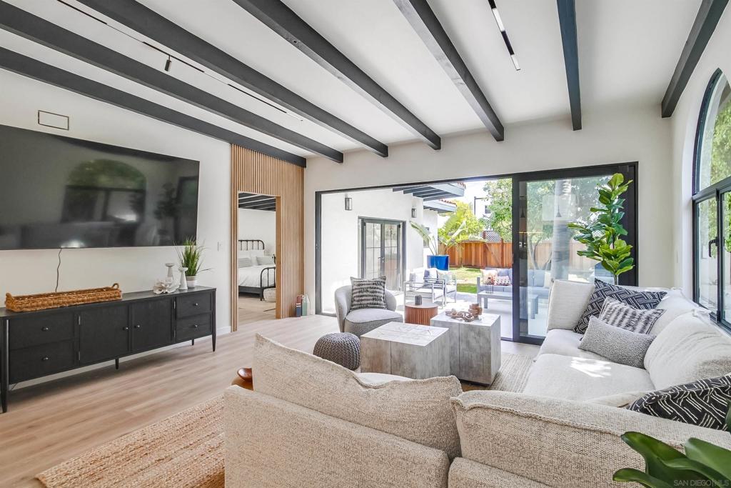 Welcome to this beautifully remodeled one-story home featuring 3 spacious bedrooms and 2.5 bathrooms.  Master is King size bed, and an extra sofa bed. Other bedrooms with Queen bed and 3rd Bedroom with 1 full and 2 twin, buck beds. The inviting open floor plan showcases high ceilings and an abundance of natural light, creating a warm and welcoming atmosphere. Enjoy living with a formal dining room separate from the open-concept kitchen and family room. The modern kitchen flows effortlessly into the family area, perfect for entertaining or family gatherings. A large glass door opens to the backyard, merging indoor and outdoor spaces and providing a picturesque view of the lush yard adorned with fruit trees. Retreat to the generous master suite, complete with a luxurious bathroom featuring a relaxing bathtub. All Utilities included. The additional bedrooms are equally spacious, perfect for family, guests, or a home office.This home is an entertainer’s dream, with plenty of space for beach games and a fun ping pong table in the yard. Experience the best of indoor-outdoor living in this exceptional property!