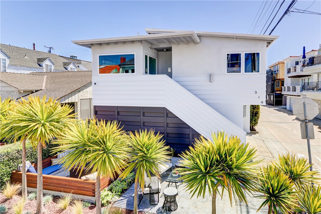 This absolutely charming beach pad is one of the coolest properties to hit the market in some time. This perfect, comfortable, and soulful beach retreat is located in an A+++ South Sand Section location and centered in the heart and soul of Manhattan Beach. This walk street gem is an absolute must see if you are looking for that sought after yet hard to find property that has the prime location, great home, ocean views, incredible outdoor space and just is just 3 blocks to the beach…Sitting on a full lot, this tastefully updated home is situated on a rare south west corner, and is ideally positioned in the 'bullseye of what is widely considerd the best location in town. Thanks to its corner orientation on the west end of the block, it is the ONLY property on the south end walk streets that has an actual backyard. There are so many cool outdoor features to enjoy such as dining area, fire pit, built-in outdoor kitchen, multiple sitting areas, and an abundance of sunshine. The perfectly thought out and tastefully remodeled home shows off its 'vibe' the moment you walk in. There are two great living spaces on this property with an impressive downstairs master bedroom suite that features a functional and beautiful open walk in closet area and lounge. The 2nd level ocean views from the kitchen and sitting area are sneaky good and the walk street patio with built-in seating and a fire pit has been known to host impromptu neighborhood sunset gatherings and more good vibes and nice ocean views. On top of ALL of this, there is a unique view protection element that makes this special property even more of a find! Parking at the beach is hard to come by…but not here, we have 4 spots. Manhattan Beach living defined…Right here. ***Be sure to see the Virtual tour..!***