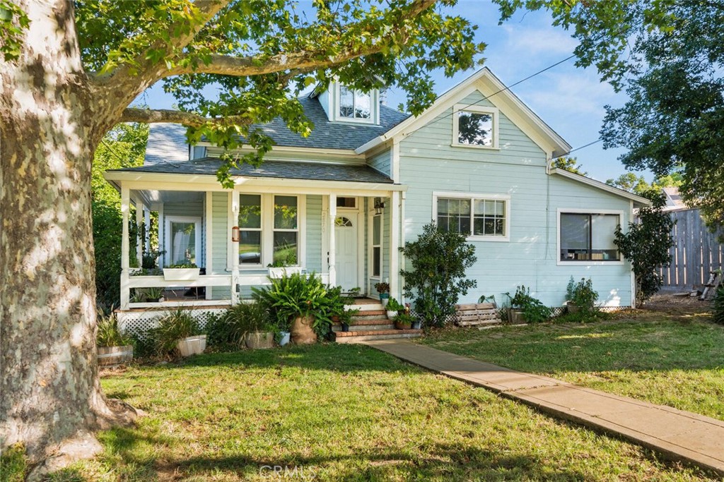 This two home property on one lot offers a flexible and functional opportunity for both investors and owner-occupants. The main home features 4 bedrooms, 2 bathrooms, and 2 living rooms, while the detached second unit includes 1 bedroom, 1 bathroom, plus bonus room. Both homes are currently rented on month-to-month leases. The main home rents for $2,750 per month, and the second unit rents for $1,250 per month. Each unit has separate electric and gas meters.
Inside the main home, you'll find new LVP flooring on the first floor, beautiful tall ceilings, and a freestanding gas stove in one of the living rooms. The kitchen is equipped with newer appliances, a large walk-in pantry, extra counter space, and plenty of natural light. A cozy nook off the kitchen can serve as a crafting, home office or homeschool area. The home boasts great curb appeal with a wraparound front porch, mature landscaping, and a fenced front yard. The separate backyard offers a paved patio area, a lovely porch with a built-in sink and counter space for outdoor cooking, a large storage shed and basement access. Additional features in the main house include a clawfoot soaking tub, and a walk-in shower in the ensuite. Recent updates (2021–2022) include a new roof, flooring, interior paint, kitchen appliances, updated ducting, and a new HVAC system in 2017. Extra LVP flooring will be left behind and could be used to replace the upstairs carpet if desired.
The second unit is fully detached and private, separated by wood fencing, with its own gated driveway and parking off Center Street. It features 1 bedroom, a bonus room, a walk-in shower, and open-concept living and kitchen space. It also includes laundry hookups, new roof and exterior paint and flooring in 2022 and a new wall-mounted A/C unit installed in 2023. A large covered front porch completes the space.
Currently generating $4,000 per month in rental income, this property offers strong cash flow, and excellent potential for multi-generational living or house hacking—live in one unit and offset your mortgage by renting the other!
