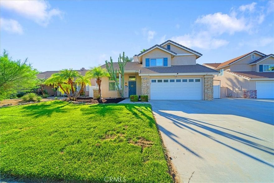 Welcome to this refreshed 4-bedroom, 3-bath home, where natural light streams through vaulted ceilings, making every room feel warm and bright. The rich tones of the new luxury vinyl wood flooring add a contemporary yet inviting touch. The open floor plan connects the living room to the kitchen with ease, featuring tile floors, timeless shaker-style cabinets, granite countertops, and stainless-steel appliances. Thoughtful upgrades include plantation shutters, modern lighting fixtures, and plush newer carpet in the bedrooms for extra comfort. A central fireplace anchors the main living area, while a cozy den just down the hall offers a quiet space to unwind. Upstairs, the primary suite boasts a roomy walk-in closet and a private bath. Step outside to a backyard designed for both work and play, with a detached home-office shed, a sparkling in-ground pool, and a spacious lawn perfect for gatherings or peaceful weekends. Tucked away on a peaceful cul-de-sac near the University of Redlands, this home brings together stylish updates, versatile living spaces, and a welcoming outdoor retreat.