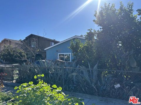 Photo of 124 E 76th Street, Los Angeles, CA 90003 (MLS # 25622985)