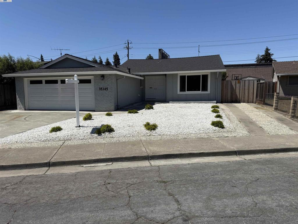 Located in a highly desirable neighborhood with highly rated schools, this remodeled 3-bedroom, 2-bathroom home sits on a spacious 7,082 sq. ft. northeast-facing lot—offering both style and potential. Step inside to discover a light-filled interior with a stunning kitchen featuring stainless steel appliances, Shaker-style cabinetry, and sleek quartz countertops. Luxury laminate plank flooring flows seamlessly throughout, accented by recessed lighting, elegant crown molding, and a modern two-tone interior paint scheme. Both bathrooms have been tastefully updated, and central HVAC ensures year-round comfort. The oversized driveway offers parking for up to four vehicles, with rare side yard access—ideal for RV or boat storage. The expansive backyard is designed for entertaining, play, future expansion, extra storage, or even a potential ADU. Ideally positioned across from Patterson Park and just minutes from Patterson Elementary, BART, ACE train, and major freeways (880 & 84), this home combines everyday convenience with exceptional livability. Open Sat 2:30-5:00 & Sun 1:30-4:30.