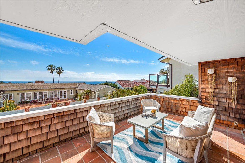 Live in Emerald Bay—Laguna Beach’s most exclusive gated beachside community. This rare opportunity offers the perfect canvas to build your family's custom dream home in a location that embodies privacy, prestige, and panoramic ocean views.
Situated on one of the most tranquil and child-friendly one-way streets in the community, the property boasts a desirable orientation that captures coastal breezes and sunlight throughout the day. The existing 3-bedroom, 3-bathroom home provides comfortable living with multiple private outdoor spaces—all showcasing views of the Pacific. However, the true value lies in the long-term potential to rebuild and create a legacy home tailored to your vision.
Emerald Bay is more than just a neighborhood—it’s a lifestyle. As a resident, you’ll enjoy access to a private white sand beach, an oceanfront pool complex, six tennis courts, sand volleyball, basketball courts, a clubhouse, lush parks, and year-round community events and children's programs. The Mediterranean-style charm and unmatched security of this gated enclave offer a sense of tranquility rarely found on the California coast.
Just a short stroll from Palm Tree Circle and moments away from Laguna Beach’s world-class dining, art galleries, and surf, this is a generational opportunity to create lasting memories and long-term value in one of Southern California’s most sought-after coastal communities.
Emerald Bay is where luxury meets lifestyle—and your dream home awaits.