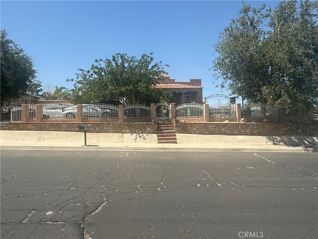 Investor income property- 2-SFR on one lot. The building on the left has 1 bedroom and 1 bathroom. The main building has 3 bedroom, 1bath, 2 separate electric meters. Building on Right is two story with a basement as well. The building on the right has a garage common driveway.
