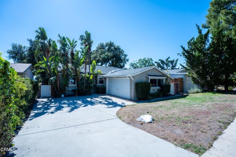 Photo of 9917 Cabanas Avenue, Los Angeles, CA 91042 (MLS # P1-28046)