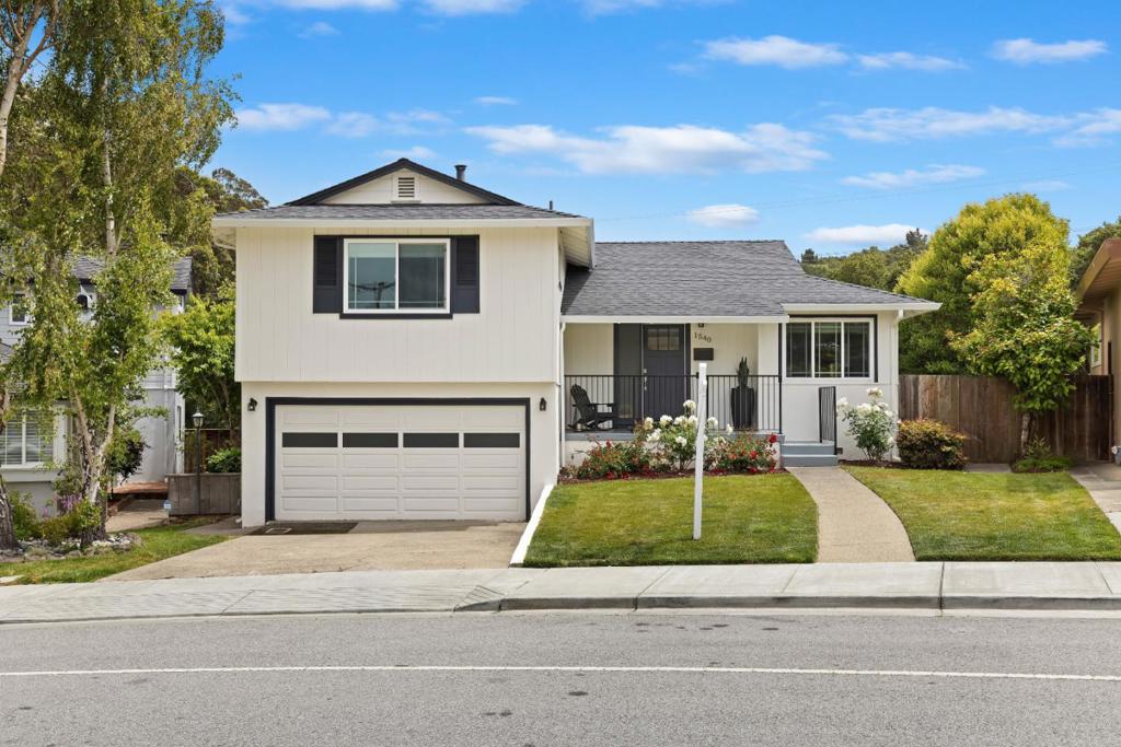 Welcome to this impeccably remodeled home in San Bruno's desirable Crestmoor neighborhood, offering the perfect blend of style, functionality, and tranquility. Nestled on the edge of Crestmoor Canyon with fabulous views! This tri-level home delivers modern upgrades and serene surroundings with no rear neighbors, just open views and peaceful vibes. Completely remodeled in 2019, this home features a gorgeous new kitchen with quartz counters, an island breakfast bar, stainless steel appliances, all new bathrooms, roof, windows, landscaping, A/C, water heater & more. Every detail thoughtfully updated for today's lifestyle. Beautiful hardwood flooring throughout & fresh interior paint. The flexible floor plan includes a private downstairs guest suite with its own entrance, ideal for in-laws or a home office. Upstairs, bright & open living spaces flow seamlessly to the spacious deck off the kitchen, perfect for entertaining or enjoying morning coffee. The large grassy backyard is a rare find offering room to relax, play, or garden, complete with a variety of fruit trees and tranquil canyon views. Located just a short stroll to a children's park, Lunardi's Market, and local shopping, with easy access to I-280 for a stress-free commute to San Francisco, the Peninsula, or Silicon Valley.
