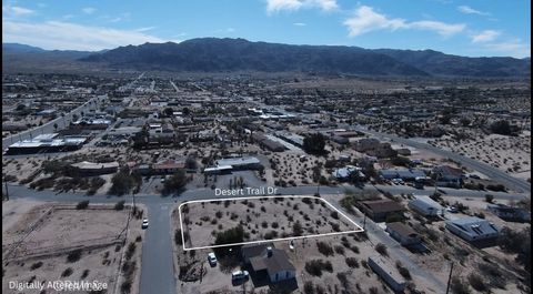 Photo of 73598 Desert Trail Drive, 29 Palms, CA 92277 (MLS # JT26017258)