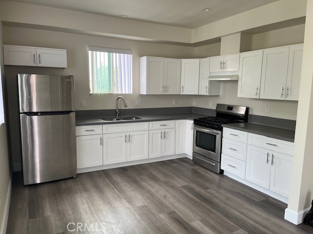 This is the one! This unit has a total of 3 bedrooms and 3 bathrooms. No fighting over who gets their own shower. This beautiful home features tons of natural light with a bright open floor plan. It has a designer kitchen that includes all appliances (refrigerator and stove) and dual pantries! Laminate wood floors, modern-classic tile, white-shaker vanities, and elegant finishes throughout. Did I mention it's all-new paint inside and out? Private washer and dryer hook ups inside the unit is huge plus! This home is sure to go quick so don't hesitate to schedule a showing. Call us today! Showings are underway and the home is move-in ready