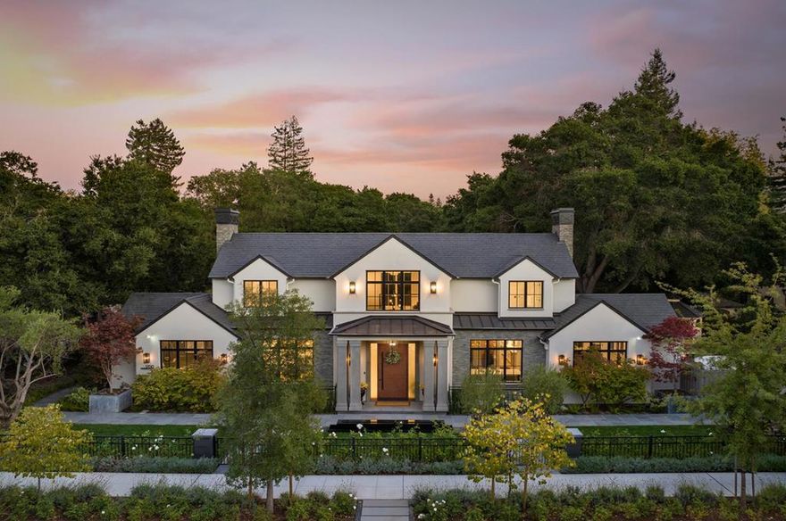GRAND NEW ESTATE IN OLD PALO ALTO | This French Contemporary estate built in 2022 occupies more than a quarter acre in the most coveted part of prestigious Old Palo Alto, deftly blending ultimate privacy, masterful craftsmanship, and premier access to top destinations. The fully gated home is crafted from only the finest materials, with spaces carefully tailored to embrace indoor-outdoor living to the fullest. Glamorous interiors dazzle with whole-house automation, an elevator, catering-grade kitchen, and entertainment-ready lower level with wine room, theater, and more. Observe masterful craftsmanship in the floating staircase, plentiful paneling, and book-matched slabs throughout. Grounds showcase water and fire features, an outdoor kitchen, mature landscaping, and expansive bluestone terraces. Contemporary splendor awaits at every turn. Less than one mile from Downtown Palo Alto, Town & Country Village, Stanford University, and exceptional schools. Designer furnishings included.