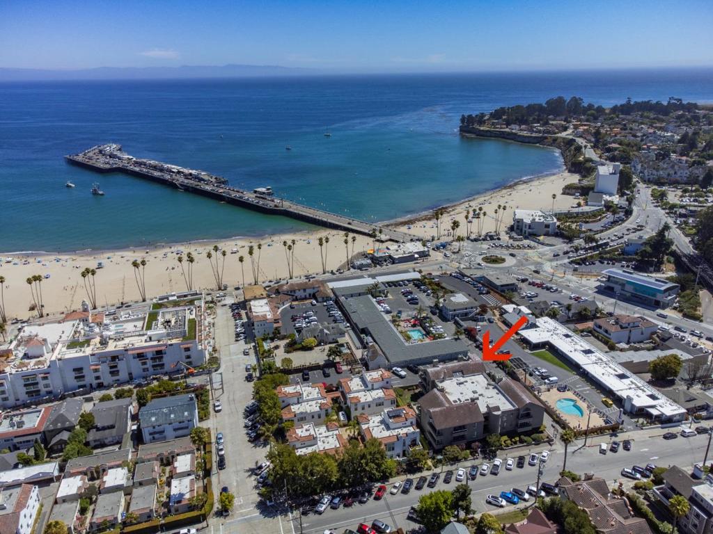 Breathtaking Ocean View Living in Santa Cruz Unobstructed views of sparkling Monterey Bay from the living room, dining room and private balcony with stunning sunrises and sunsets in this beautifully upgraded, open-concept condo. Desigined for relaxation and style, this home blends modern finishes and offers the ultimate in comfort and beachside luxury. Just a short stroll to the Wharf, Boardwalk, beach, restaurants and shopping.Wired outlet for EV in assigned parking spaces.