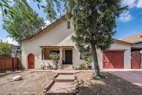 Photo of 205 N Avenue 66, Los Angeles, CA 90042 (MLS # DW26201824)