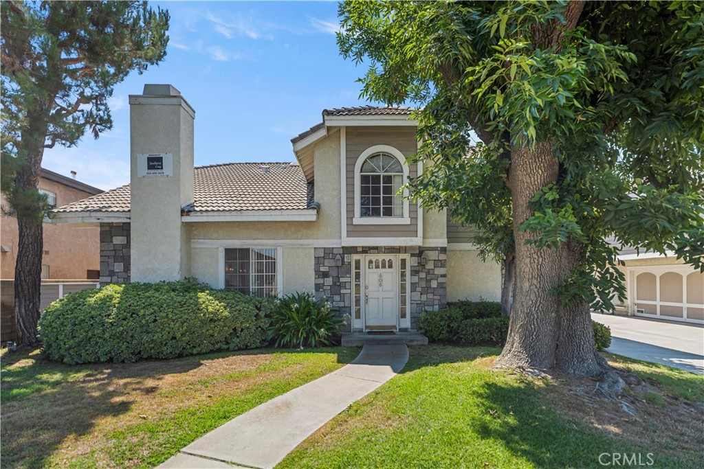 Charming Two-Story Townhouse in Alhambra. This well-maintained townhouse shares only one common wall, providing the feel of a duplex. The spacious living room offers high ceilings, abundant natural light, a fireplace, and direct access to a cozy private patio. The first floor is enhanced with newer laminate flooring, while the home includes 3 comfortable bedrooms upstairs, Two full bathrooms and guest bathroom downstairs. The primary suite boasts a walk-in closet and bathroom. Attached 2-car garage with direct access to the kitchen ensures everyday convenience. This community is beautifully landscaped and provides ample guest parking. Conveniently located near schools, a library, popular restaurants, and community churches. Ready to move-in!