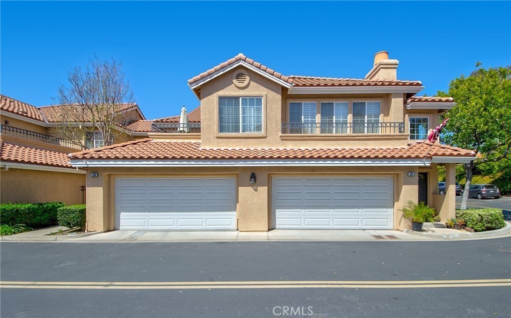 Welcome home to Sunny Rancho Santa Margarita! This wonderful property is nestled in the desirable Sonoma Court community. The home features a wonderful open floor plan complete with cathedral ceilings, open living room with cozy fireplace and plenty of natural light. The kitchen includes stainless steel appliances, brand new quartz countertops, modern sink and faucet and plenty of cabinet space. Dining area opens to kitchen & living room with direct access to outdoor private patio, perfect to sit by a fire pit or grill a delicious meal. Main floor includes a bonus room currently being used as a home office and can easily be used as a third bedroom. The upstairs area is comprised of two ample sized bedrooms with private bathrooms, including a spacious main bedroom with high ceilings and plenty of closet space. This cozy unit is conveniently close to the community pool, spa & guest parking. The garage has Tesla Level 2 charger as well. Superb location, adjacent to O’neill Regional Park and a very short distance to restaurants, shopping, gym, biking & hiking trails and easy access to toll roads. This is one you don’t want to miss!