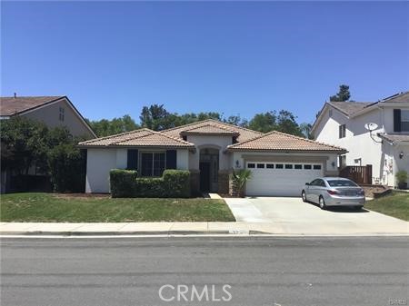 Murrieta Large single story home with high ceilings and spacious bedrooms. Entering in this home you will see the large formal living space with a vast view thru the home to the lush, entertainers backyard. Too the left when entering there are 2 adjoining bedrooms with a Jack and Jill bathroom with dual vanities and separate shower tub. From there going into the formal dining area you are flanked by two pillars for a grand entrance. Dining area has beautiful light feature and tile flooring. Connecting to the dining area you enter the spacious Kitchen with Maple Cabinetry, under mount sink, stainless appliances and Granite counters. In the center of the kitchen you have a large island with granite top and bar top seating which opens up to the family room for great entertainment. In the family room you have state of the art surround sound system for a theater experience. Going thru the family room you enter the formal living room where you can enjoy the fireplace and view out the french doors to the California Room with extended patio and entertainers back yard. Backyard has turf lawn and sand section for very low maintenance, also you have separate bar/bbq area that is patio covered. You also have a nice fire pit and huge top of the line Jacuzzi for relaxation. Going back in you have the spacious master bedroom with separate walk in closets on each side of the walkway to the large bathroom that has separate tub and shower, 2 sink vanity with seating area. On the other end of the house you also have a separate laundry room, full bathroom, and den that can be a 4th bedroom. This is a beautiful home and ready to move into. Come and see it!!