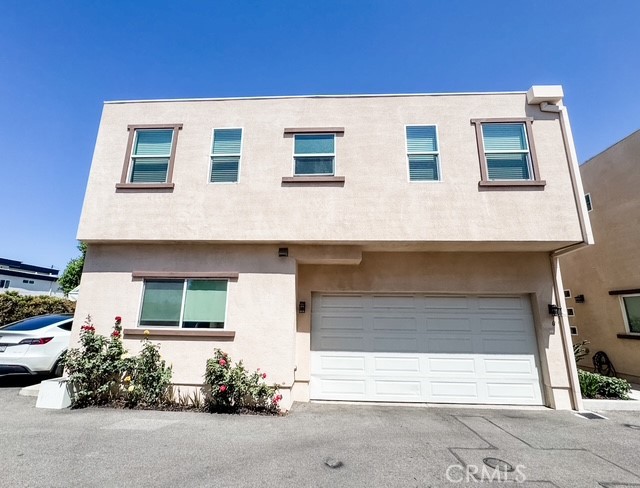 Welcome to modern, completely turn-key detached townhome for sale. This elegant, property is setting the standard for Living in Panorama City. The home was built in 2018 and offers all the accommodations and benefits of newer construction.
As you first walk in you will appreciate the functionality of the open floor plan, an attached garage and the high ceilings. The first floor includes a large, bright living room with a fireplace, open and modern kitchen, walk-in pantry, guest bathroom and panty of storage under the stairs. Upgraded kitchen features energy star stainless-steel appliances, dark custom-built cabinets with white quartz countertops and grey subway tile backsplash. The sliding doors from the living room lead to a private landscaped backyard perfect for a quiet evening or entertaining friends and family.
Second floor includes 2 master suites, main master has fireplace, walk-in closet, sliding doors to a balcony with amazing panoramic views, another 2 bedrooms and a bath, large closets, stackable washer/dryer laundry. Additional features include water-resistant laminate flooring and skylights through out the house, electric charger for EV vehicle in the garage, tankless water heater, 5 ton A/C unit.
This property sits on the corner section of the 12 unit luxury, well-maintained community with low HOA fees. Neighborhood is close to popular shopping, restaurants, top-rated schools, and easy access to freeways 405 and 5. Motivated Seller! Bring your Offer!