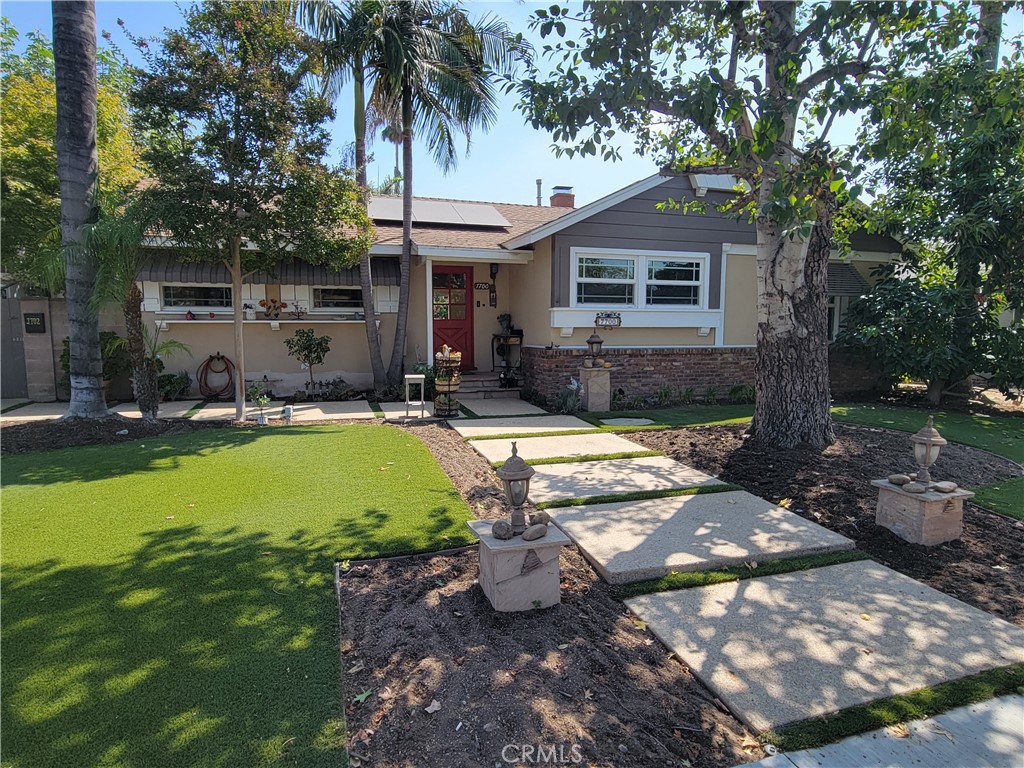 Custom remodeled Winnetka home with no expense spared offering 4 Bedrooms & 3 baths. Bright and open floor plan with 1,792 square feet. Gourmet kitchen with custom cabinets, granite counter tops and stainless-steel appliances. Lease includes Refrigerator, Washer and Dryer. Dining room opens to the oversized living room with corner brick fireplace. Primary bedroom with private bath, large closet and sliding glass door leading to the backyard. Hardwood floors, recessed lighting, ceiling fans throughout. Lower utility bills with professionally landscaped yard, artificial grass and solar panels. The Lease is for the front house only and will NOT include the ADU.