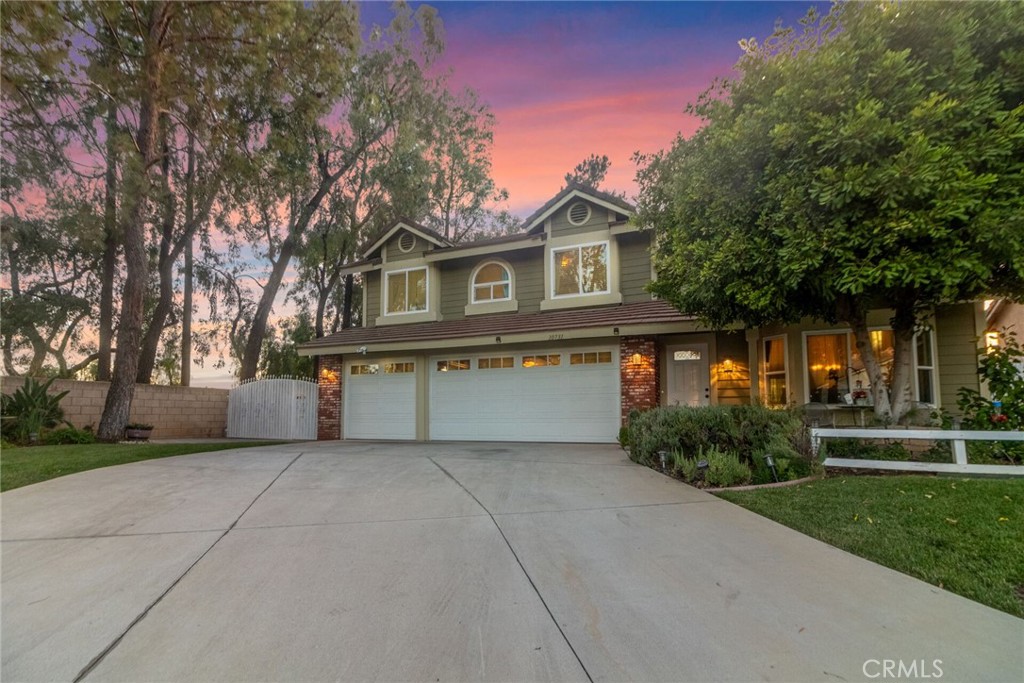 This is a Beautiful turn key two-story home offers 5 bedrooms and 3 bathrooms, including a convenient downstairs bedroom and full bath. As you enter, you're greeted by the spacious formal living and dining rooms. The remodeled kitchen features stainless steel appliances, newer cabinets, and elegant quartz countertops. Upstairs, the primary suite boast a recently rebuilt balcony with beautiful mountain views, a remodeled bathroom with dual sinks, Jacuzzi bathtub and a walk-in closet. Three additional Bedrooms and an additional hallway remodeled bathroom. The home is equipped with double-pane windows for energy efficiency. The backyard is perfect relaxation and entertaining, featuring a cozy firepit, a beautiful fountain, and several fruit including lemon, pomegranate, plum, tangerine, loquat, apricot, guava, Kumquat, avocado, and grapefruit. Nestle in a quiet cul-de -sac surrounded by mature trees, this home offers both privacy and shade. Don't miss this incredible opportunity to own a home in one of Sunnymead Ranch's most sought- after neighborhoods and enjoy exclusive access to the clubhouse, private lake, swimming pool, tennis courts, and more.
