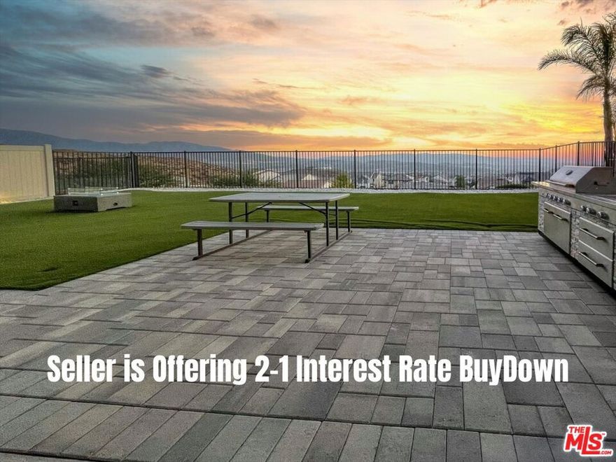Enjoy lower monthly payments for the first two years! Seller is offering a 2-1 interest rate buydown to make your purchase more affordable!! Welcome Home to 28521 Sparrow Way, a beautifully upgraded home newly built in 2020 with VIEWS located in the popular and sought after community of Skyline in the heart of Santa Clarita. This thoughtfully designed SMART home features an open-concept layout with a spacious living area, modern finishes, and an abundance of natural light. The Skyline Community is a picturesque master-planned community that is so thoughtfully designed. The neighborhood offers residents a perfect blend of natural beauty and modern convenience, with easy access to parks, trails, schools, and shopping. At the heart of Skyline are two beautiful community centers that feature resort-style amenities designed for comfort, wellness, and connection. Residents enjoy access to sparkling pools and soothing spas, state-of-the-art fitness centers, and cozy outdoor lounge areas complete with fire pits and fireplaces. ideal for evening gatherings. The clubhouses also include barbecue areas, play zones, and scenic spots to relax or entertain. Whether you're taking a morning jog along the winding paseos, spending the afternoon at the private park, or enjoying the breathtaking mountain views, Skyline offers a lifestyle that feels like a daily retreat and resort all located minutes from your new home. The kitchen is a chef's dream, complete with granite countertops, stainless steel appliances, a large island, and an oversized pantry. Throughout the home, you'll find recessed lighting, smart thermostats, and app-controlled dimmable lighting that enhance both style and functionality. Upstairs, the generous loft provides flexible space for work or play, while the primary suite offers a serene retreat with a spacious walk-in closet and en-suite bath featuring a walk-in shower, soaking tub, and quartz countertops. Secondary bedrooms include pre-wired fan/light switches and dimmable lighting for comfort and convenience. Take advantage of two solar systems designed to keep your power bills close to zero! An entertainer's backyard with a covered patio, firepit, BBQ, turf, pavers, and a storage shed with VIEWS! The three-car garage is EV-ready and includes a smart opener and water softener loop. Additional features include a tiled entryway, modern vinyl flooring in wet areas, programmable outdoor lighting, and a well-appointed laundry room with quartz counters and overhead drying rack. This move-in ready home blends comfort, energy efficiency, and indoor-outdoor living perfect for enjoying all that Santa Clarita has to offer. Close Proximity to 14 Freeway to I-5. This home offers not just a beautiful home, residents enjoy easy access to a variety of local amenities, including nearby parks like Central Park featuring sports courts, playgrounds, and scenic trails and the Santa Clara River Trail, perfect for biking or leisurely strolls. Outdoor enthusiasts will also appreciate the proximity to the Santa Clarita Woodlands Park for weekend hikes and nature outings. Convenient shopping and dining options are just minutes away at Westfield Valencia Town Center and Old Town Newhall, where you'll find everything from popular retail stores to charming boutiques, trendy eateries, and entertainment venues. Whether you're grabbing coffee, dining out, or exploring local shops, you'll love the balance of suburban tranquility and modern convenience this location provides.