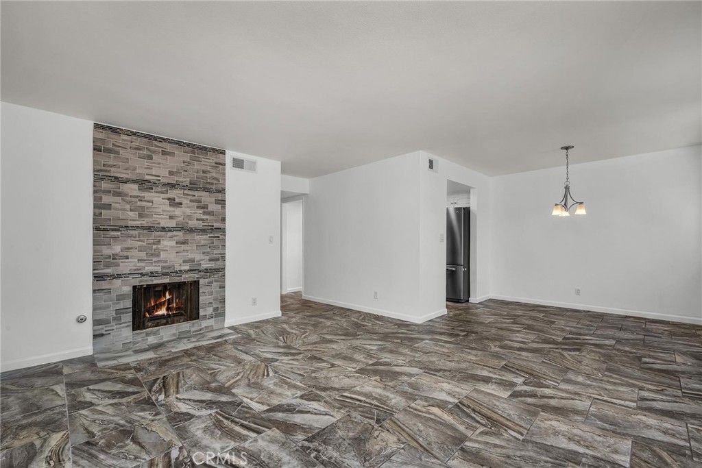 Photo of 21333 Lassen Street #6H, Chatsworth, CA 91311 (MLS # SR25195787)