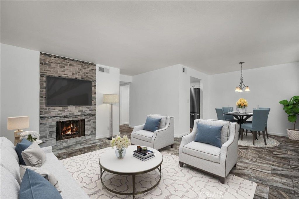 Photo of 21333 Lassen Street #6H, Chatsworth, CA 91311 (MLS # SR25195787)
