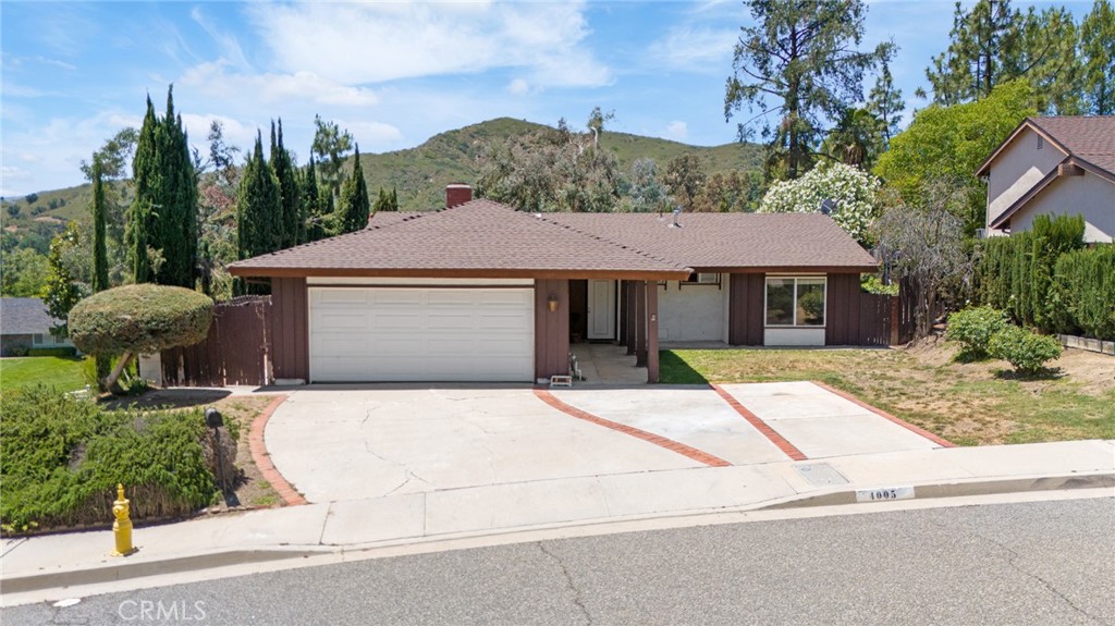 Welcome to 4005 Joelton Dr—a beautifully maintained single-family residence offering 3 bedrooms and 2 bathrooms in one of Agoura Hills' most desirable neighborhoods. This light-filled home features soaring high ceilings and a cozy fireplace in the spacious living room, perfect for relaxing or entertaining. Enjoy year-round comfort with central air conditioning, and take full advantage of your own private backyard oasis complete with a sparkling pool. Ideally situated near top-rated schools, parks, and local amenities, this home combines comfort, style, and location. Don’t miss your chance to own a slice of Agoura Hills!