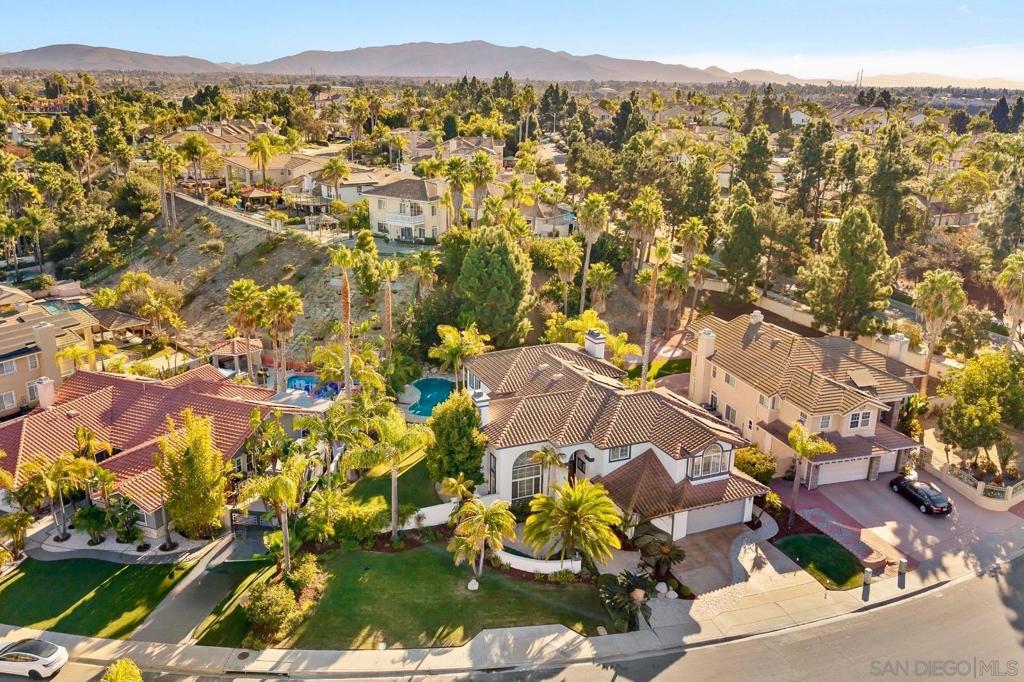 Welcome to an estate where achievement meets timeless elegance. This 5-bedroom, 4.5-bath residence in Rancho Del Rey offers nearly 4,300 sq. ft. of refined living, designed for families who value space, comfort, and prestige. Soaring ceilings and sunlit living areas frame every gathering, while the chef’s kitchen—with quartz counters and professional appliances—invites effortless entertaining. Upstairs, the primary suite is a true retreat, complete with a spa bath, dual closets, and a wrap-around balcony overlooking your private resort. Outside, a sparkling pool with cascading waterfall, palapa, and built-in BBQ set the stage for unforgettable weekends under the California sun. With NO HOA and NO MELLO-ROOS, this rare estate offers the ultimate blend of freedom, luxury, and family legacy. Homes like this define Rancho Del Rey living—schedule your private showing today. This Rancho Del Rey estate combines elegance and function with nearly 4,300 sq. ft., 5 bedrooms, and 4.5 bathrooms. Recent updates include a chef’s kitchen with quartz counters, professional appliances, modern stair railings, and refreshed bathrooms with designer finishes. Outdoor living is exceptional: pool with cascading waterfall, palapa with built-in BBQ, and multiple patios for entertaining. Large lot, attached 3-car garage, and ample storage throughout. No HOA / No Mello-Roos. Minutes to schools, parks, dining, and freeway access. Perfect for families, multigenerational living, or those who love hosting unforgettable gatherings.