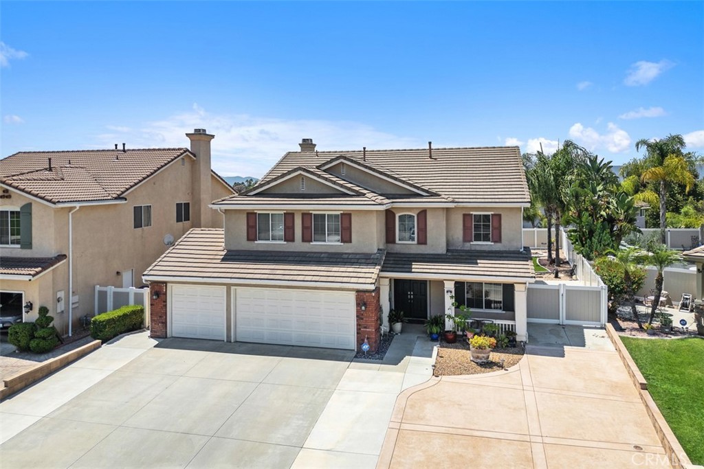 RV parking/Main floor bedroom/Fully landscaped large lot/No Carpet/No HOA. Welcome to this impressive property located in the highly desirable community of Murrieta. Located conveniently close to schools, shopping, freeway access. The curb appeal is undeniable with wide driveway and RV parking with RV charger and own sewer. The parking space includes both outside and inside of the gate . The property features main floor bedroom and one full bath. Laundry room locates downstairs. Separate family and living room, gourmet kitchen opens up to the family room. Remodeled the bathrooms with upgrade electric features. Master bedroom suite and remaining well-sized 3 bedrooms upstairs. When stepping out to the fully covered-patio backyard, you will fall in love with this beautiful and low-maintenance garden instantly. Complete with well-maintained artificial grass, Fire pit and custom-made gazebo, which includes lights features and radio player. Also How exciting it is to harvest fruits in seasons, such as Cherry, Lime, Lemon and Fig. Don't miss this exceptional and stunning house out !