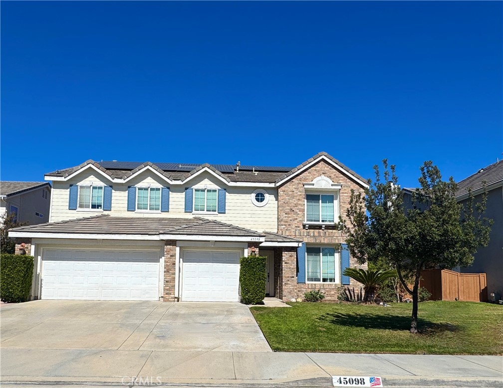 This gorgoues 5-bed, 4-bath with bonus room home offers 4,046 sq ft with 3-car garage(side/side), SOLAR, Alumiwood patio cover, downstairs bed/bath, newer AC & outdoor private Spa. Beautiful wood floors throughout, upgraded kitchen and huge open concept family room. In detail, you will step inside to high ceilings, rich wood floors, and an expansive formal living area that flows seamlessly into a wide open layout. The gourmet kitchen is an entertainer’s dream, featuring a large center island, granite countertops, stainless steel appliances, butler’s pantry, and extended dining area that opens to a spacious family room with cozy fireplace. Primary Bedroom is oversized and has a massive closet! Downstairs offers a private bedroom and full bath—ideal for guests or multigenerational living. Upstairs you’ll find an oversized loft perfect for a game room, movie night, or home gym. Outside has a beautiful Allumiwood patio cover with TV mount that stays. Garage is epoxyed and has overhead storage. Morgan Hill's resort-style amenities: clubhouse, fitness center, pool/spa, playgrounds, and walking trails. All conveniently located near award winning schools, sports park, dog park, wine country, many wineries, shopping, and wonderful dining.