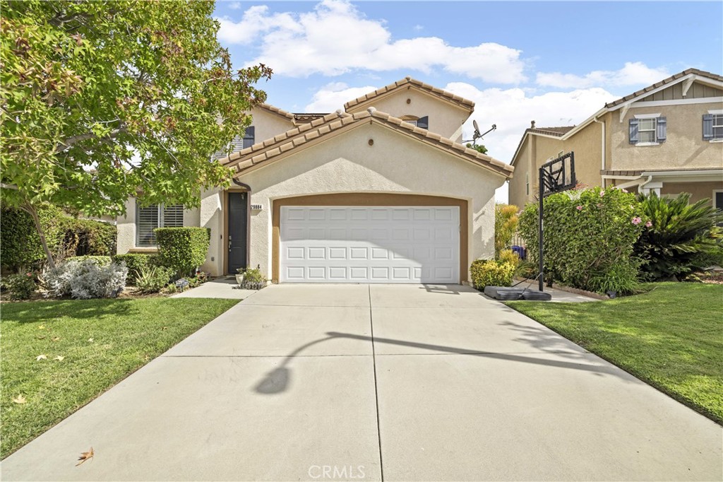 Tucked away on a quiet cul-de-sac in Hasley Hills, this beautifully maintained home offers 4 bedrooms and 2.5 baths with a functional layout designed for comfort and everyday living. The light-filled living and dining areas flow seamlessly into the family room, creating an inviting open-concept feel. The remodeled kitchen features white cabinetry, granite countertops, a full tile backsplash, stainless steel appliances, and pendant lighting over the center island. Upstairs includes all bedrooms, with a spacious primary suite offering a walk-in closet and private bath. The fourth bedroom, without a closet, provides flexibility as an office, loft, or guest room. Additional highlights include an indoor laundry room, recessed lighting, and a convenient downstairs powder room for guests. Step outside to a private backyard retreat surrounded by lush landscaping, mature trees, a covered patio, and an above-ground spa perfect for relaxing or entertaining. With wood-like floors downstairs, newer carpet upstairs, plantation shutters, and no Mello Roos, this home delivers charm, functionality, and value just minutes from shopping, restaurants, and freeway access.